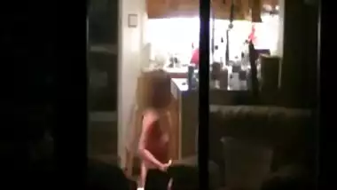 Neighbour in her kitchen