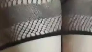 Hot Desi babe in fishnet dress has her pussy XXX rubbed by lover