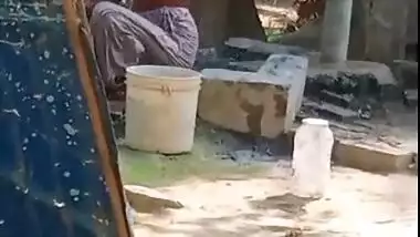 Village bhabhi nude bath outdoors hidden cam